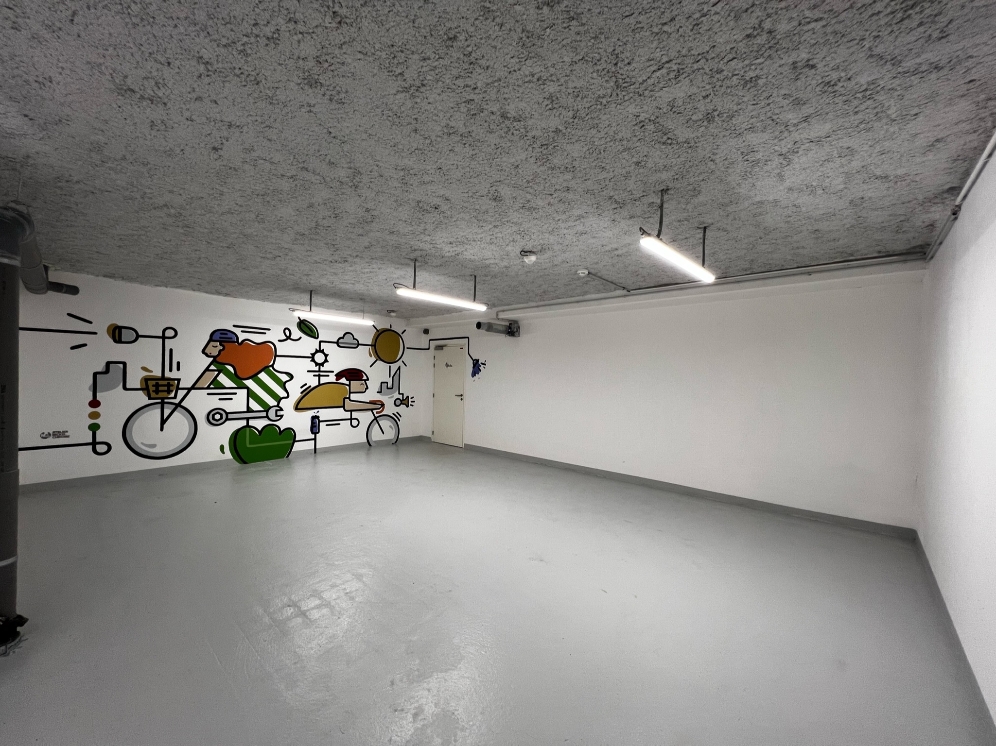 Le local vélo de Green Oak après notre intervention à la peinture.